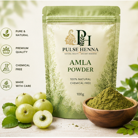 Pouch of Pulse Henna Amla Powder with a bowl of powder and amla fruits on a light background